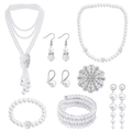 Multi-piece pearl jewelry set with layered necklaces, bracelets, dangling earrings, and flower charm