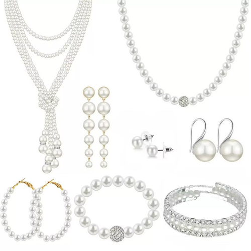 Pearl jewelry set with layered necklace, hoop earrings, drop earrings, bracelet and studs.